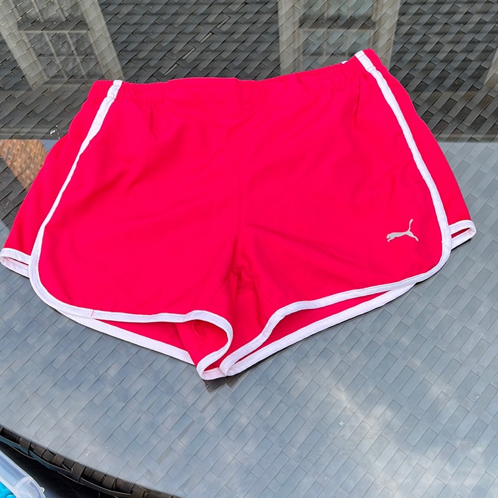 Puma running shorts with built in underwear. Worn once and like new.